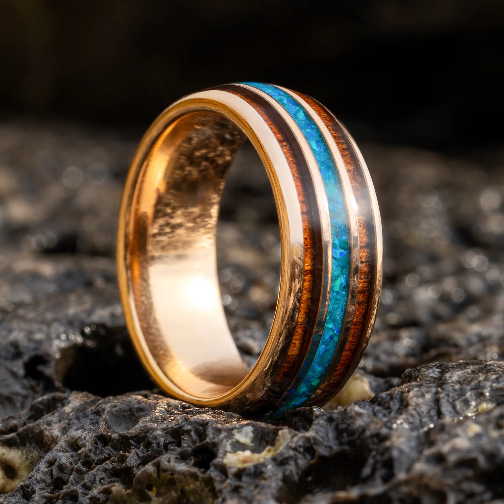 Aeternus rose gold tungsten ring with koa wood and blue opal inlay by Natural Rings