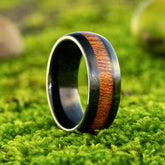 Umbran black tungsten ring with koa wood inlay by Natural Rings